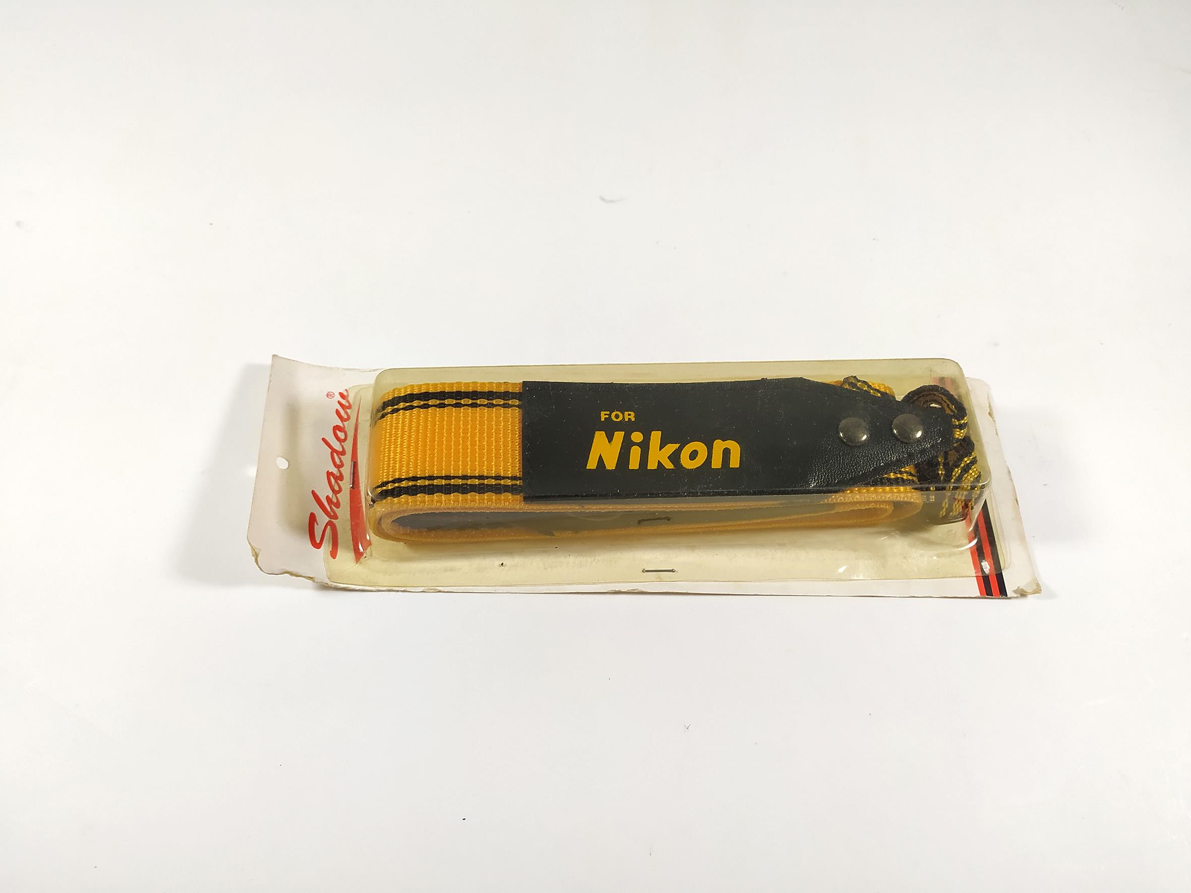 بند آکبند زرد دوربین عکاسی مارک Nikon